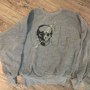 Gray skull sweatshirt/long sleeve with lighting bolt size xs